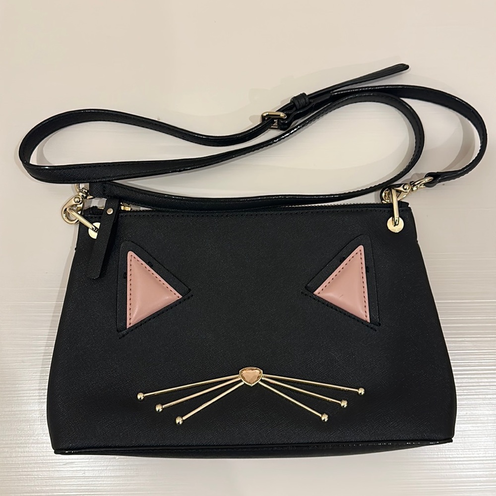 Kate spade cat whiskers purse.